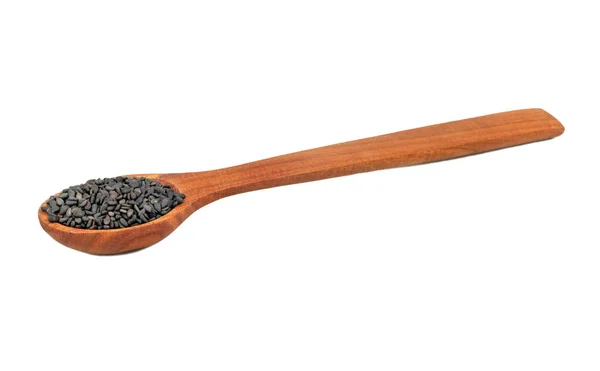 Czarny sezam w łyżka — Zdjęcie stockowe