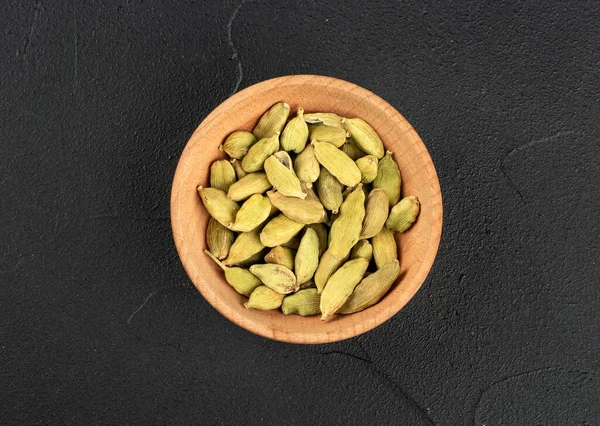 Cardamom in bowl — Stock Photo, Image