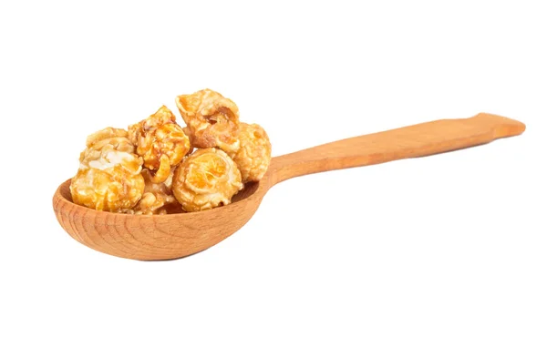 Caramel popcorn in spoon — Stock Photo, Image