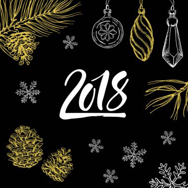 Yeni yıl 2018 el simgesi Noel süslemeleri ile yazılı 