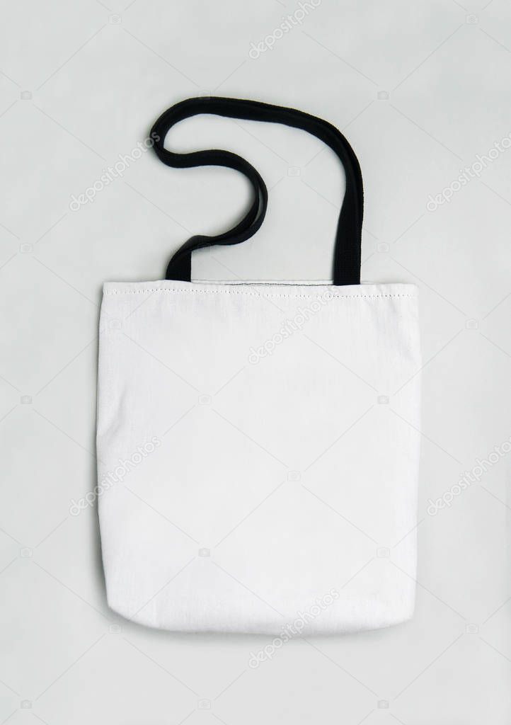 White textile bag on grey background ready to use for your design mockups.