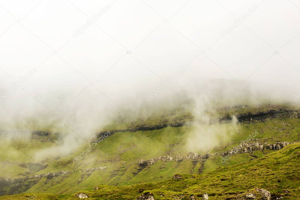 Cloudy mountains of Faroe Islands.