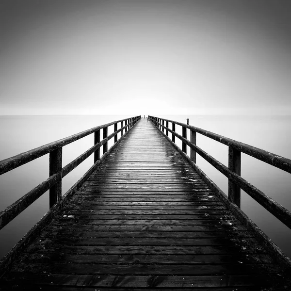 The Baltic Sea coast with pier in Sassnitz on the island Ruegen during rainy day, Northern Germany. — Stock Photo, Image