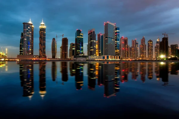 Fascinating reflection of tallest skyscrapers in Bussiness Bay d — Stock Photo, Image