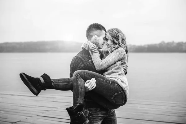 Young boy holding his girl in arms — ストック写真