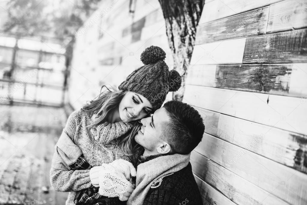 black and white photo of Happy young couple