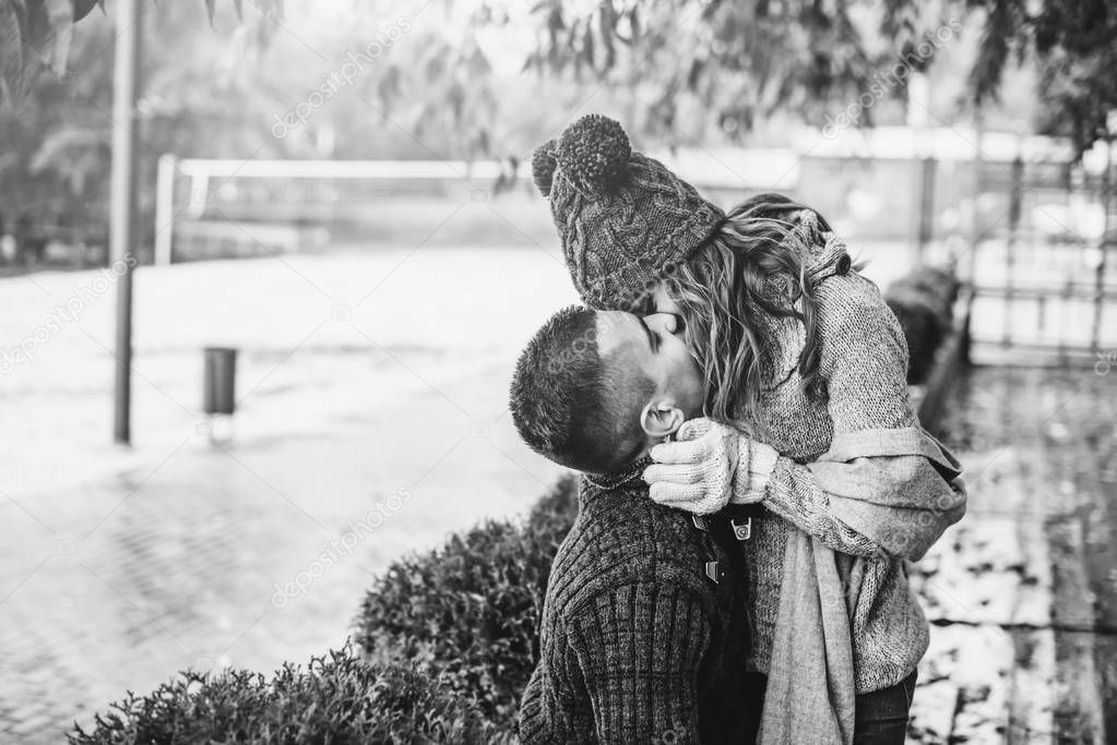 black and white photo of Happy young couple