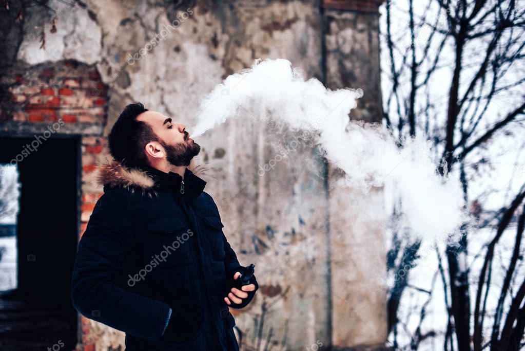 Man  smoking  electronic cigarette