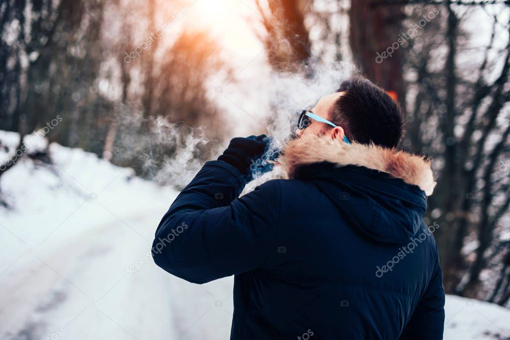 Man smoking  electronic cigarette 