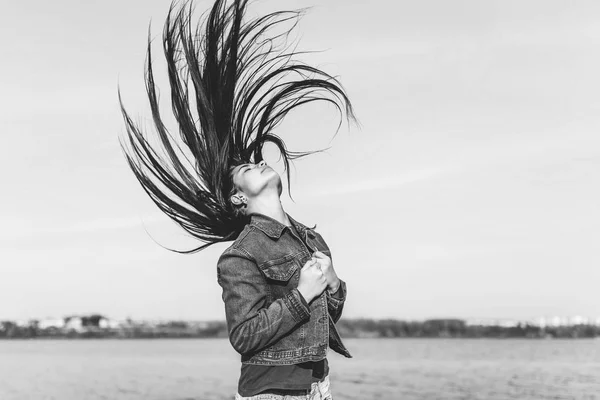 Young girl with long streaming hair — Stock Photo, Image