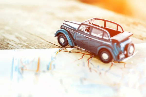 Toy car on the map — Stock Photo, Image