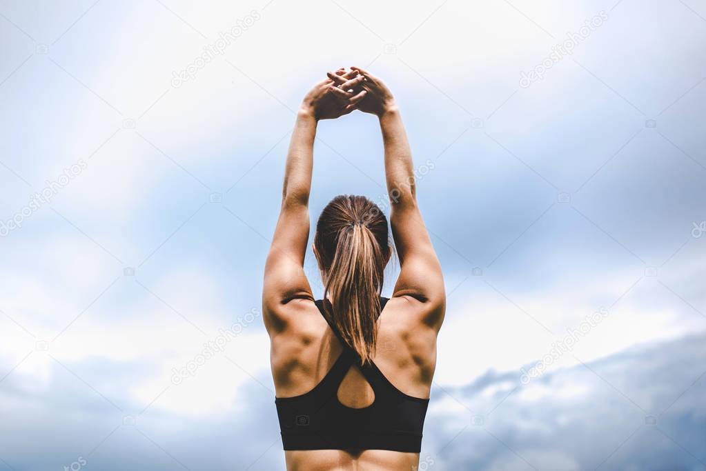 sporty girl showing stretching