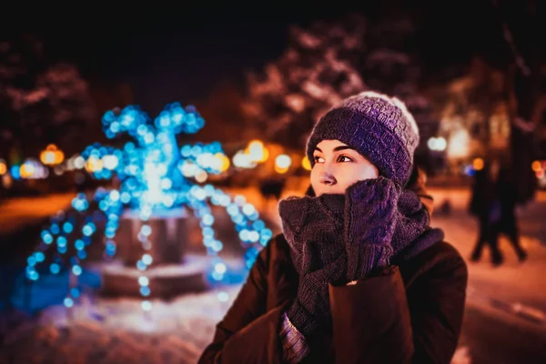 Dreamy woman with christmas lights — Stock Photo, Image