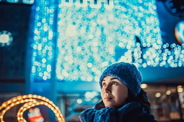 Dreamy woman with christmas lights — Stock Photo, Image