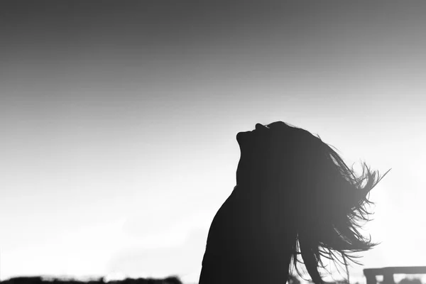 Girl with blowing up hair — Stock Photo, Image