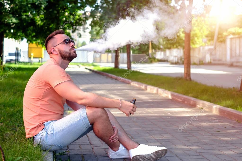 Man  smoke electronic cigarette 