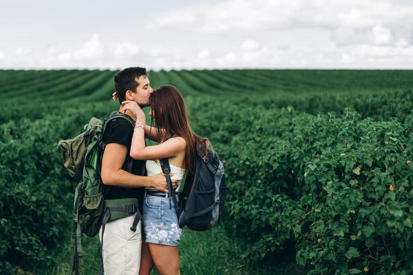 Portrait Happy Young Couple Backpacks Field Spring Man Woman Walking — Stock Photo, Image