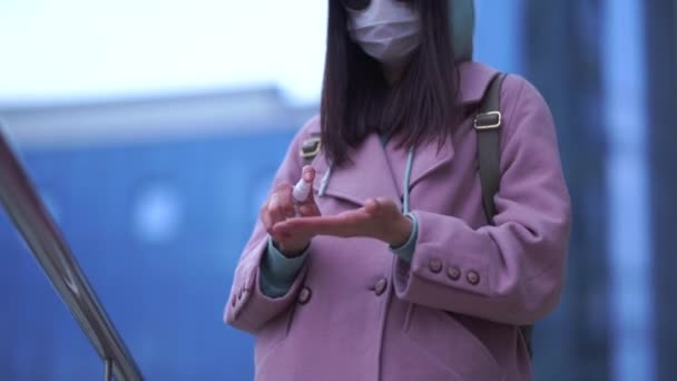 Close Hands Female Medical Mask Cleaning Her Hands Spray Sanitizer — Stock Video