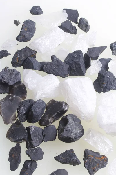 Stones for household cleaning and mineralization of water. The crystals are black and white.