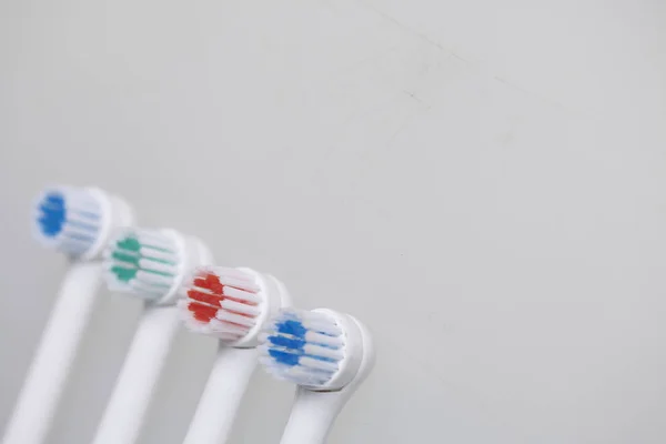 Nozzles for electric toothbrush. On a white background. — Stock Photo, Image