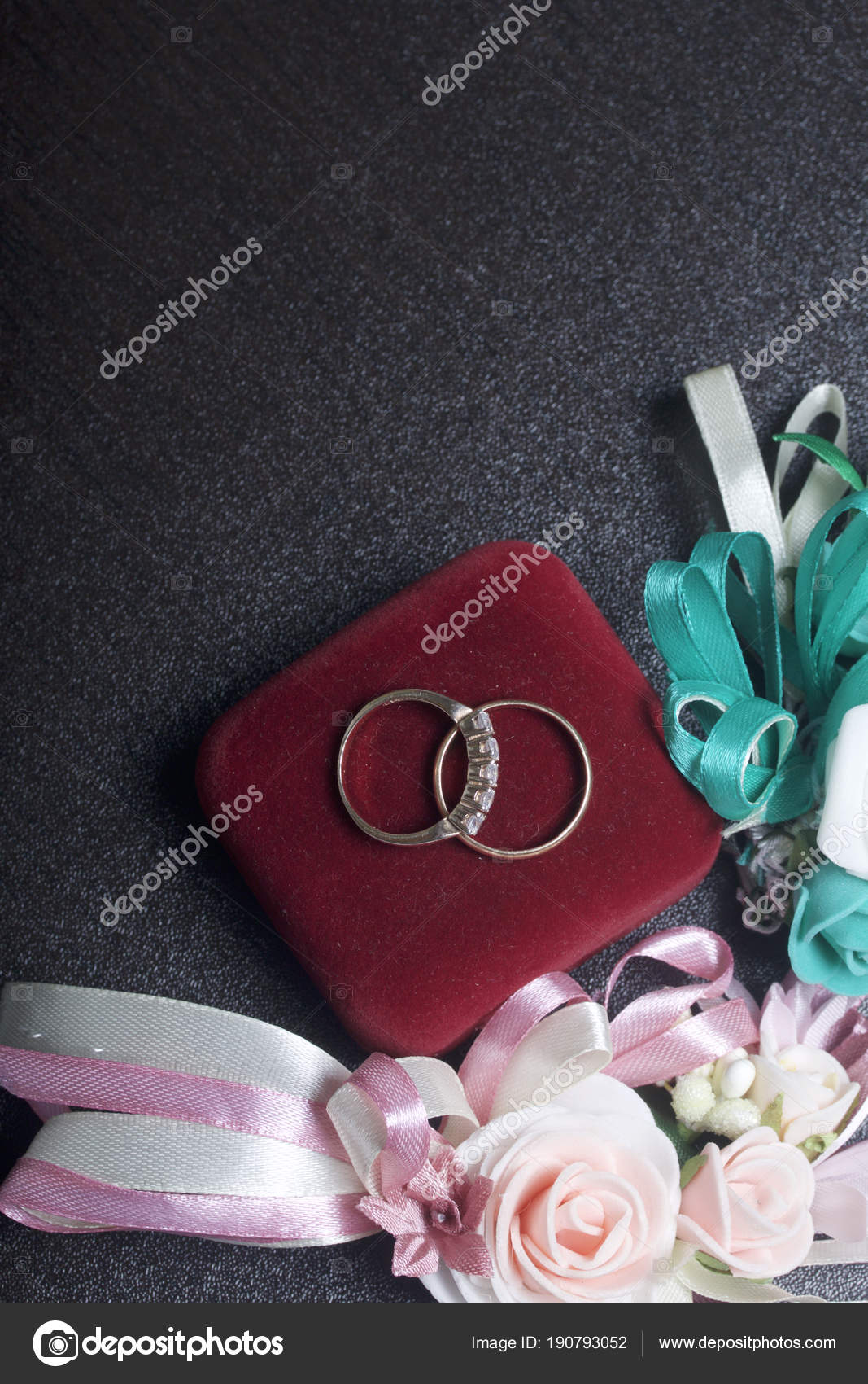 Wedding Decor Wedding Rings Lie On Dark Surface Nearby Are