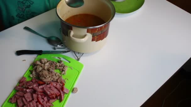 Woman Pours Olives Meat Broth Soup Saltwort Ingredients Cooking Table — Stock Video