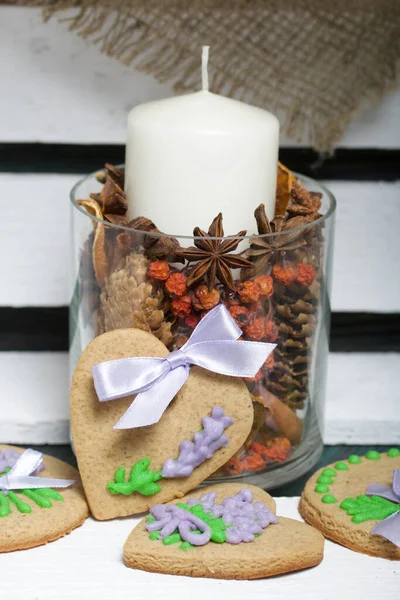 Gingerbread Cookies Decorated Glaze Some Ribbons Tied Bow Nearby Candle — Stock Photo, Image