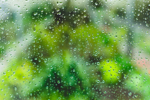 Капли на окно, мокрое стекло — стоковое фото