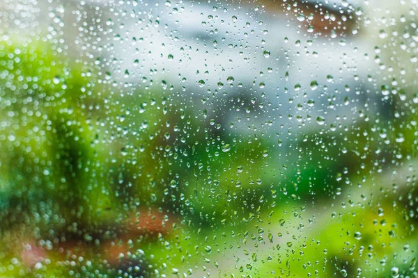 Gotas en la ventana, vidrio mojado — Foto de Stock