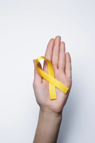 Sarı kurdele yandan, sembol mesane kanseri, sarkom, kemik kans