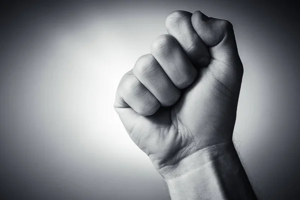 Clenched fist held in protest — Stock Photo, Image