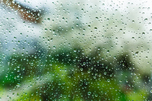 Gotas en la ventana, vidrio mojado — Foto de Stock