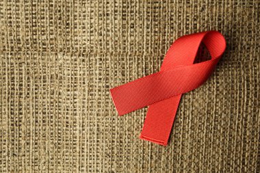 kırmızı kurdele çuval bezi, HIV şerit üzerinde AIDS
