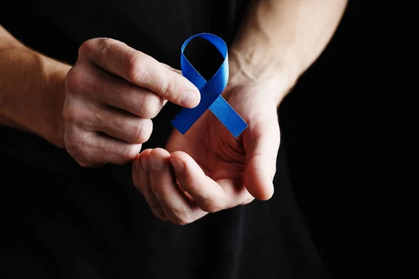 prostate cancer ribbon, colon cancer concept, blue ribbon