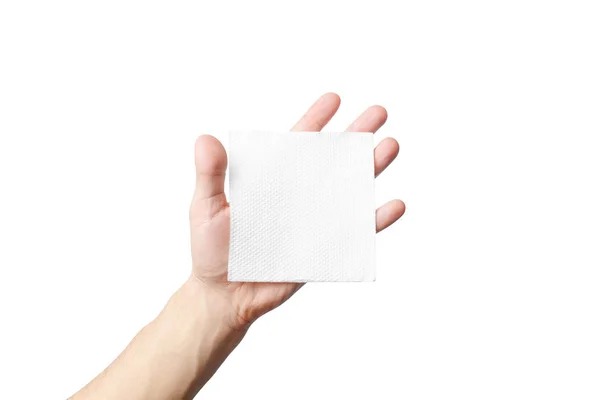 Tovagliolo bianco pulito in mano è isolato su sfondo bianco — Foto Stock