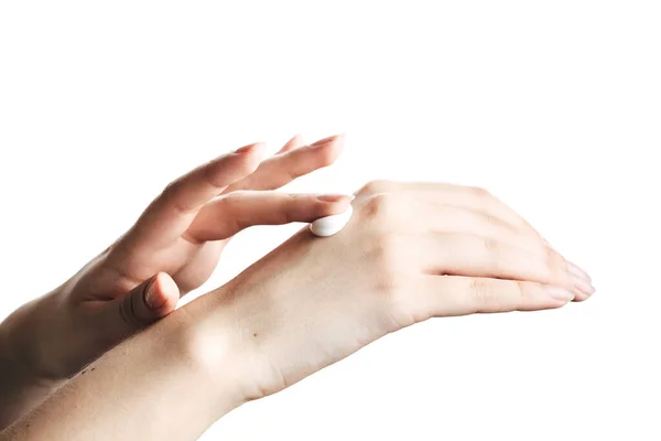 Nők kéz izolálni, alkalmazása krém, masszázs — Stock Fotó