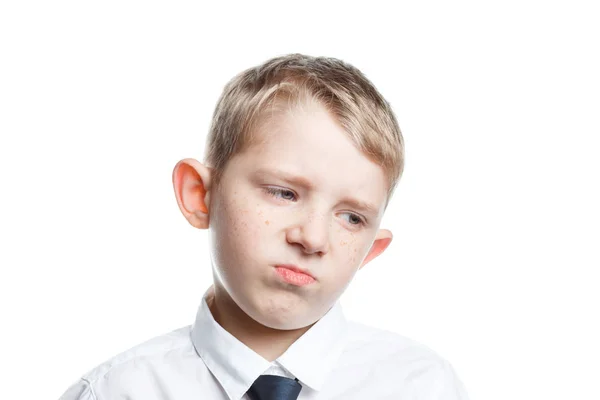 Sad boy on isolated background schoolar in uniform — Stock Photo, Image