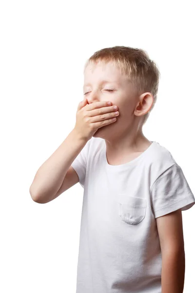 Little boy yawns closing his mouth — Stockfoto