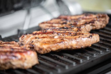 Juicy grilled meat steaks.