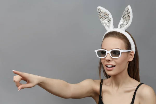 Woman with rabbit ears in white 3d glasses — Stock Photo, Image