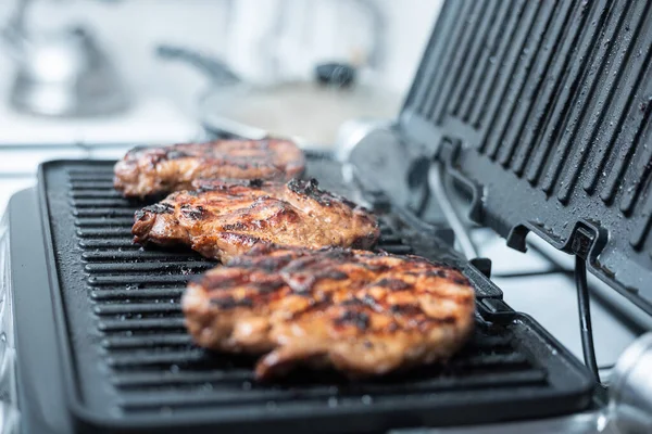 Steaks on the grill. — Stock Photo, Image