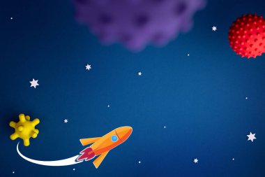 Astronot, yıldız ve roket ile mavi arkaplan