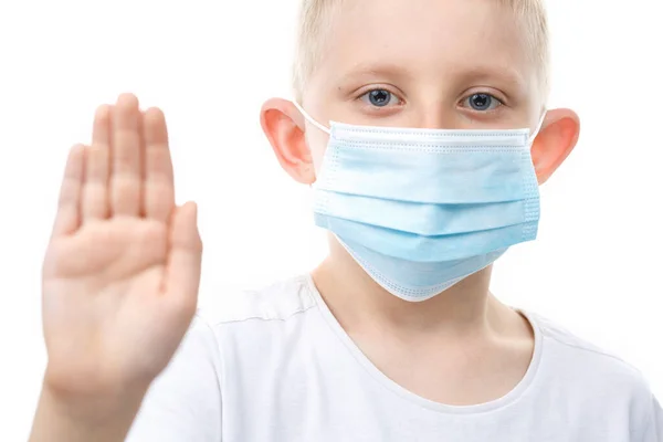 Child in medical mask put a palm in the stop sign. — Stock Photo, Image