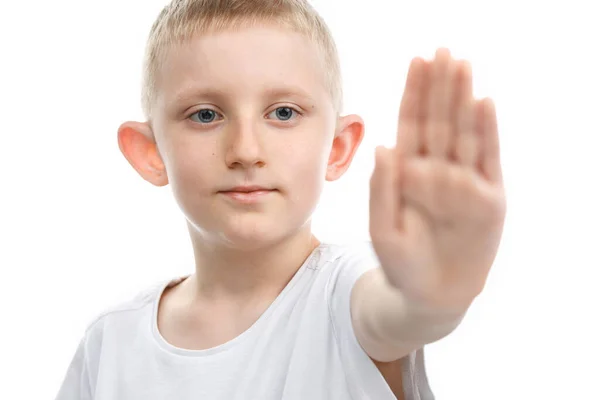 Kind zet een handpalm in het stopbord — Stockfoto