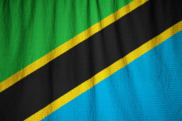 Primo piano della Bandiera della Tanzania increspata, Bandiera della Tanzania che soffia nel vento — Foto Stock