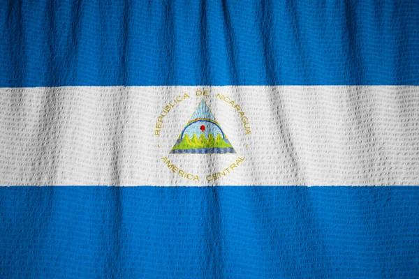 赢在吹皱的尼加拉瓜国旗，尼加拉瓜国旗的特写镜头 — 图库照片