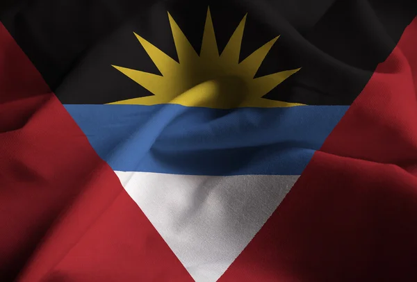 Closeup de Ruffled Antígua e Barbuda Bandeira — Fotografia de Stock