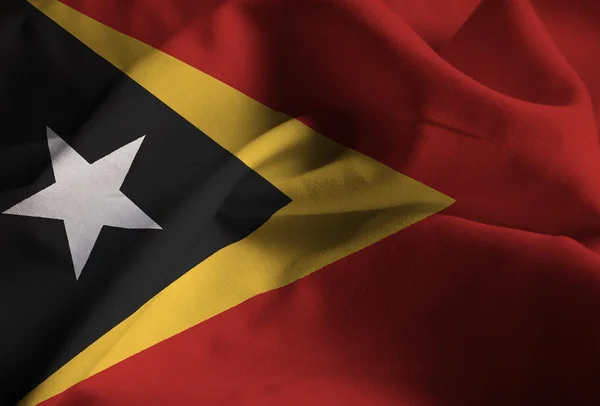 Closeup of Ruffled East Timor Flag, East Timor Flag Blowing in Wind — Stock Photo, Image