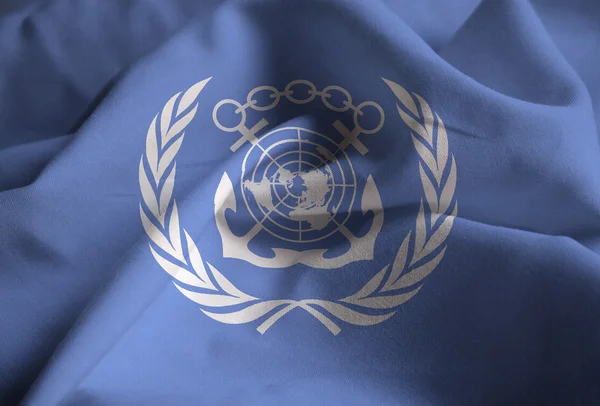 Closeup της σημαίας αναστατωμένα του Διεθνούς Ναυτιλιακού Οργανισμού — Φωτογραφία Αρχείου