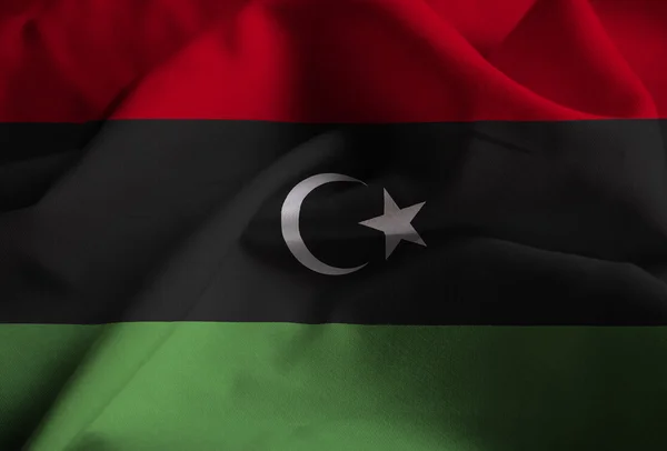 Nahaufnahme der gerafften libyschen Flagge, libysche Flagge weht im Wind — Stockfoto
